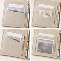 Classeur moderne en lin personnalisé à feuilles mobiles pour une gestion optimale du papier, idéal pour les cadeaux d'entreprise et les présentations.