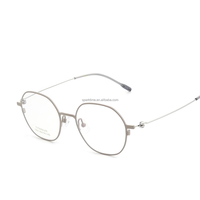 Montura de gafas ópticas redondas de titanio unisex, monturas de gafas graduadas ligeras a la moda