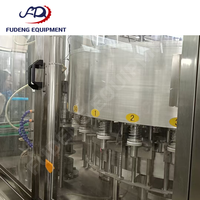 Machine de remplissage et de bouchage automatique électrique d'occasion 4000 bph pour jus avec pulpe, en stock, vente chaude