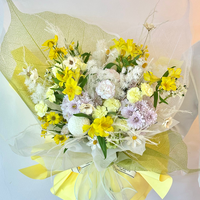 Vente en gros d'usine : Papier d'emballage créatif et imperméable pour bouquets de fleurs, en forme de feuille, transparent en OPP