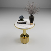 Ensemble de table basse ronde moderne avec deux plateaux en pierre frittée et base en acier inoxydable au fini or et blanc