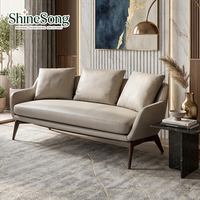Sofa nordique moderne de simplicité de conception de luxe minimaliste en cuir style italien style italien pour l'hôtel ensemble pour siège de couple