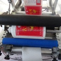 Vente à chaud imprimante de code de date manuelle semi-automatique machine d'étiquetage de bouteilles rondes d'eau en verre plastique PET autocollant