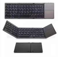 Clavier sans fil portable pliable avec pavé tactile, souris USB filaire, mini BT rechargeable et nouveau produit