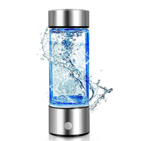 Vente en gros Bouteilles d'eau en verre borosilicaté Purificateur Filtre Bouteille de boisson Garrafa D'agua Logo personnalisé Camping Bouteille de boisson alcaline