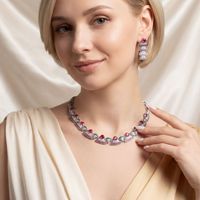 Boucles d'oreilles longues en rubis et pompons, style éventail, de luxe léger haut de gamme, pour banquets, accessoires transfrontaliers Europe-Amérique
