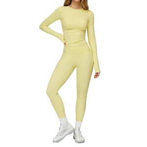 Conjunto de yoga para mujer Zechuang, Top de manga larga y leggings de color sólido, ajuste ceñido, ropa deportiva de secado rápido para correr al aire libre TZ8519 - Product Image 1