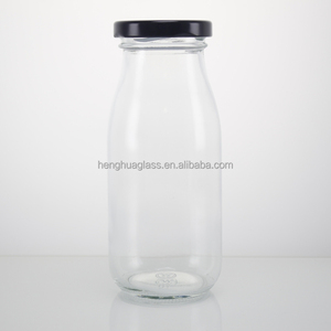 Wholesale 150ml <strong>200ml</strong> 250ml 500ml Round Glass <strong>Milk</strong> Bottles Empty Clear Fruit Juice Glass Bottle with Metal Lids - Product Image 3