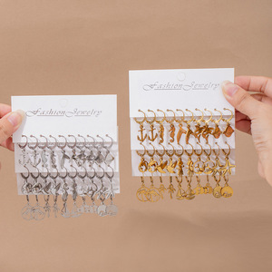 Boucles d'oreilles créoles fantaisie en alliage de zinc, thème marin, couleur argent et or - Product Image 1