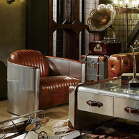 Fauteuil Chesterfield individuel vintage unique de style industriel du milieu du siècle, en aluminium et cuir, mobilier de cave à vin