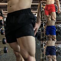 Shorts de sport pour hommes, vente chaude, séchage rapide, respirant, couleur unie, ample et confortable