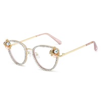 La plus récente vente en gros de lunettes de luxe en diamant anti-lumière bleue Oeil de chat fabrique des lunettes à lumière bleue pour hommes