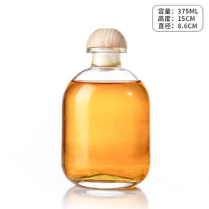 Vacío 250ml 500ml Whisky <span class=keywords><strong>Vodka</strong></span> Glass Gin Botellas Boston Bebidas redondas Botella alcohólica con corcho de madera - Product Image 6