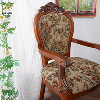 Chaise de salle à manger européenne vintage en bois massif sculpté avec revêtement en tissu floral