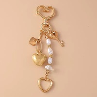 Porte-clés mode lune et étoile avec design étoile de mer-perle chaîne coeur porte-clés mignon sac à dos cintre accessoire