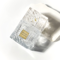 Boîte cosmétique rectangulaire de haute qualité en gros bouteille d'huile d'olive en relief bouteilles de parfum en verre uniques bouteille de parfum vide
