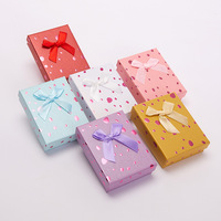 Boîte à bagues en papier YZ en gros, luxe, personnalisée avec logo, emballage de rangement pour bijoux en papier de qualité supérieure avec nœud en ruban