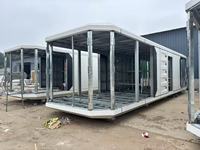Maison modulaire préfabriquée OEM, capsule spatiale, structure en acier, conception de mini-cabane pour la vie à distance, retraite de vacances