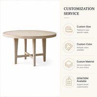 Table à manger ronde en bois massif sur mesure avec base en X, fabricant de tables circulaires en bois de luxe moderne pour projets d'hôtels de charme