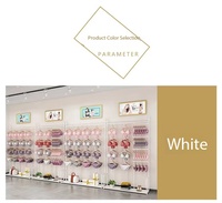 Vente directe d'usine de présentoirs à lingerie multi-niveaux en fer doré, adaptés aux magasins de lingerie