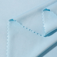 Tissu imprimé en jersey brossé double poly-spandex DTY de haute qualité, finition pêche laiteuse, pour vêtements