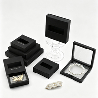 Boîte à bijoux flottante creuse en film PE, présentoir anti-ternissement en carton noir pour bagues, boucles d'oreilles, bracelets – Fabricant