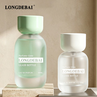 Flacon de parfum de luxe élégant en verre dépoli mat 50ml 100ml avec capuchon cylindrique or/argent pour Eau de Parfum vide