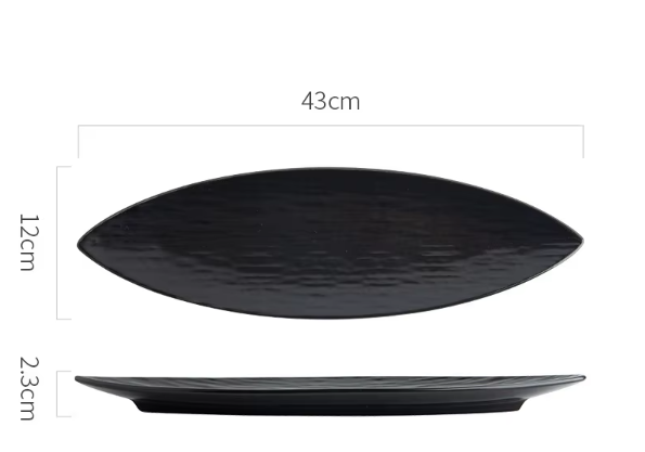 Assiette noire en forme de feuille à motif de roche de sables mouvants de 17 pouces