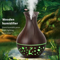 Diffuseur d'huiles essentielles en vente chaude, 150 ml, petit diffuseur d'aromathérapie avec lumière nocturne colorée, humidificateur à ultrasons à brume fraîche