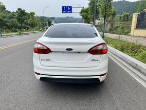 <span class=keywords><strong>Ford</strong></span> <span class=keywords><strong>Fiesta</strong></span> 1.5L d'<span class=keywords><strong>occasion</strong></span> 2009-2014 avec volant à gauche, boîte automatique, sièges en cuir, caméra de recul, pneus R17 - Prix avantageux sur l'extérieur - Product Image 5