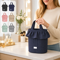 Sac de rangement pour poussette à pois marine avec volants, grand sac à couches à cordon de serrage, sac suspendu avec bouton-pression pour voyage de bébé et rangement pour maman