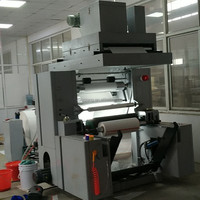 Machine d'impression flexographique à commande par ordinateur Imprimante flexographique Deux couleurs Double couleurs Film plastique en fer fourni Pile automatique