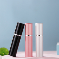 Mini flacon vaporisateur de parfum rechargeable portable 5 ml et 10 ml pour les voyages avec mécanisme de pompage intégré