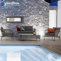 Ensemble de salle à manger d'extérieur moderne en corde tressée avec structure en alliage d'aluminium, résistant aux intempéries et durable pour jardin, salon, hôtel, complexe hôtelier
