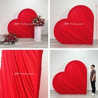 DKB Crafts Wholesale Luxurious Engagement Wedding Drapery Fabric Backdrop Red Spandex Fabric and Lying Heat-Shaped Arch Backdrop