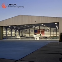 Hangar préfabriqué en acier soudé sur mesure, conforme aux normes ASTM, à grande portée, pour l'entretien des avions à l'aéroport