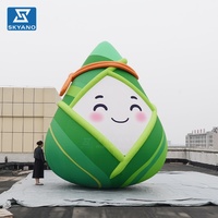 Ballon publicitaire géant gonflable personnalisé en forme de dessin animé Zongzi (ravioli de riz) pour la décoration extérieure du Festival des Bateaux-Dragons