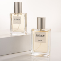 Vaporisateur de parfum en verre 40ml/50ml personnalisé rond vide clair parfum avec pompe à sceller