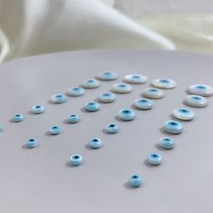 ผ้าถูพื้นสีขาวธรรมชาติทรงหลังเบี้ยทรงกลมขนาด10มม. ดวงตาชั่วร้ายผลิตจากโรงงาน - Product Image 4