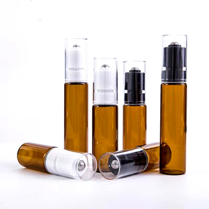 Botellas <span class=keywords><strong>enrollables</strong></span> de vidrio transparente marrón <span class=keywords><strong>oscuro</strong></span> con cubierta a prueba de fugas para rodillo para bola Perfume Crema para el cuidado de la piel Almacenamiento de aceite esencial - Product Image 1