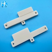 Base étagée en nitrure d'aluminium (AlN) usinée sur mesure par CNC avec tolérance stricte pour l'emballage de semi-conducteurs