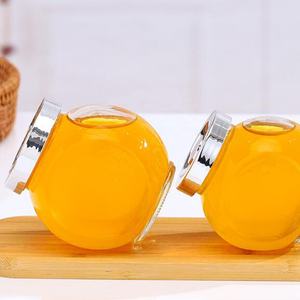 Pot en verre de <span class=keywords><strong>miel</strong></span> d'abeille à <span class=keywords><strong>prix</strong></span> bon marché avec tige d'agitation pots de <span class=keywords><strong>miel</strong></span> vides de qualité alimentaire bouteille de stockage en verre de jus de fruits - Product Image 2