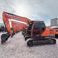 Excavadora de cadenas usada Doosan DX140LCA de alto rendimiento y bajo costo con tren de rodaje estable para proyectos de construcción en carreteras y limpieza de terrenos