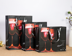 ถุงกระดาษสีขาวพิมพ์ลายตามสั่ง หรูหรา ทนทาน เป็นมิตรกับสิ่งแวดล้อม พับเก็บได้ ใช้ซ้ำได้ พร้อมหูหิ้วริบบิ้น - Product Image 3