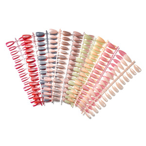 Vente en gros <span class=keywords><strong>de</strong></span> 30 pièces <span class=keywords><strong>de</strong></span> faux ongles courts en amande, effet œil <span class=keywords><strong>de</strong></span> chat, couleur unie, fabriqués à la machine, réutilisables, ongles artificiels - Product Image 1