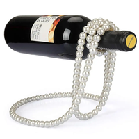 Elegan rumah gaya mewah rak anggur gantung merah kreatif kalung mutiara logam desain untuk pesta ember es atas meja