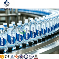 Machine de remplissage et d'embouteillage automatique Sokos pour petites bouteilles en plastique d'eau minérale pure, pour ligne complète de production d'eau