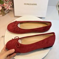 Sandales plates pour femme en daim à imprimé léopard, avec nœud décoratif, à enfiler, bout rond, style ballerines, décontractées pour le quotidien et le bureau