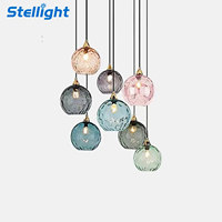 Lustre LED suspendu au design nordique simple et créatif, motif aquatique, avec des luminaires en verre teinté pour salle à manger et salon