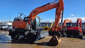 Excavatrice sur pneus d'occasion Daewoo Doosan DXW140 DX150W DX165W avec moteur, boîte de vitesses, pompe, roulement et coupleur rapide Doosan - Product Image 6